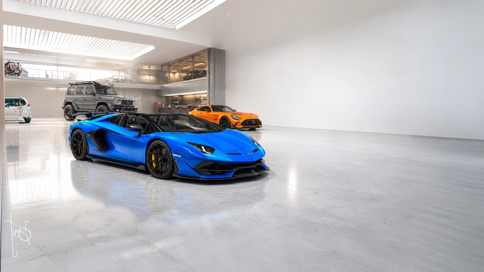 Blue Lamborghini Aventador Roadster in the Chicago Motor Cars showroom, with Mercedes-Benz vehicles in the background.