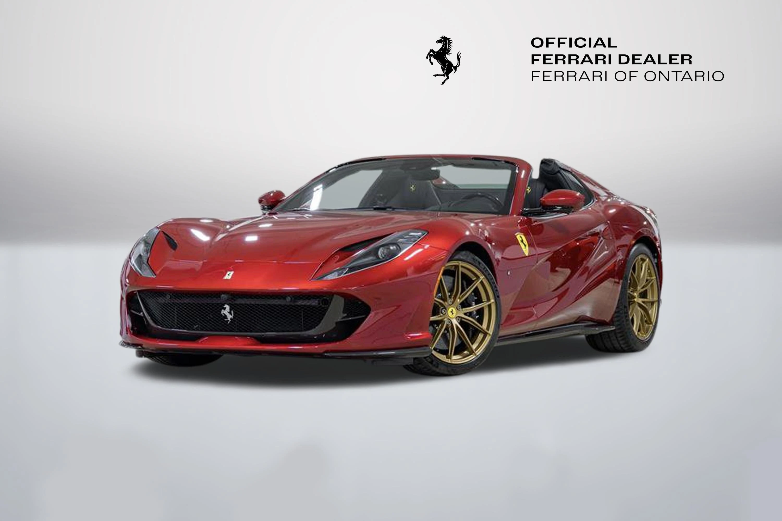 Red Ferrari 812 GTS from the Ferrari of Ontario pre-owned inventory, three-quarter front view.