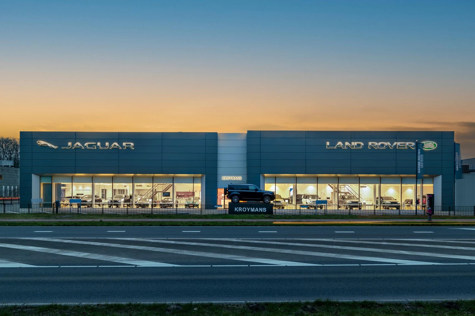 Exterior of the Kroymans Jaguar Land Rover dealership in Hilversum.