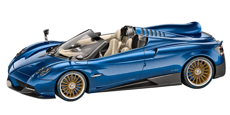 Blue carbon Pagani Huayra Roadster with gold wheels, front three-quarter view
