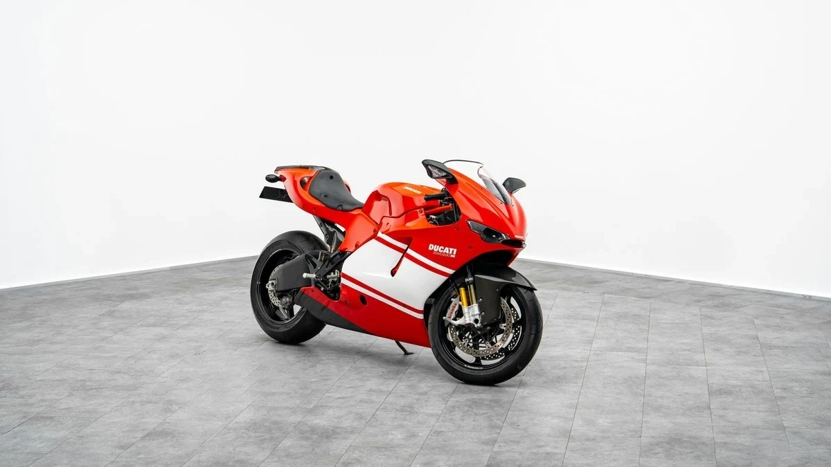 2008 Ducati Desmosedici RR in red and white, entire motorcycle in front three-quarter view