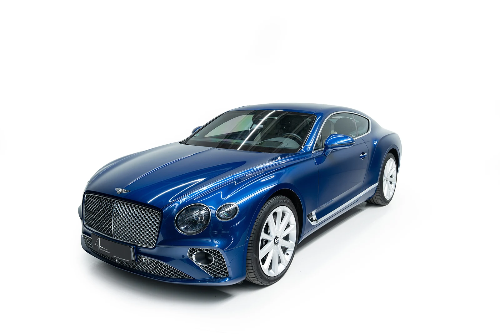 Blue Bentley Continental GT, full front three-quarter view