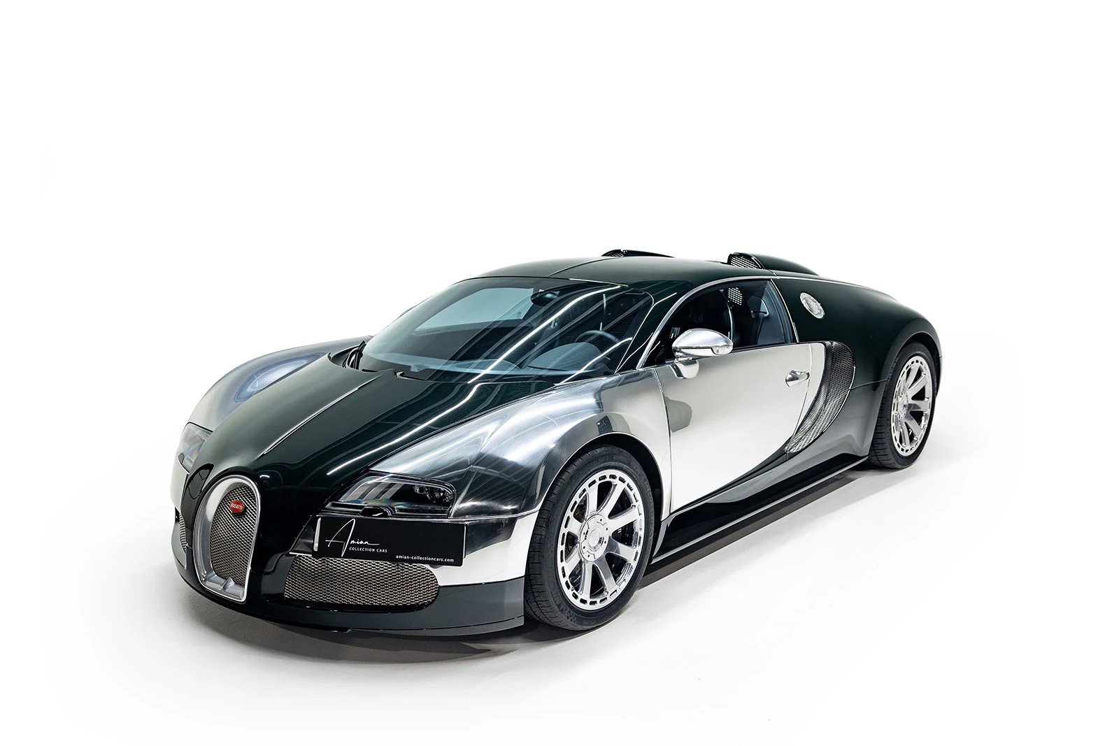 Green and polished aluminum Bugatti Veyron Centenaire, full front three-quarter view