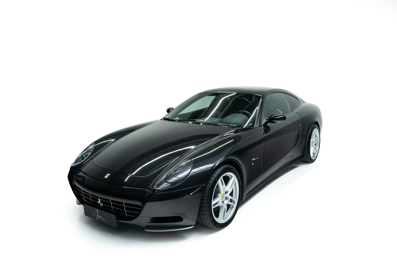 Black Ferrari 612 Scaglietti, full front three-quarter view