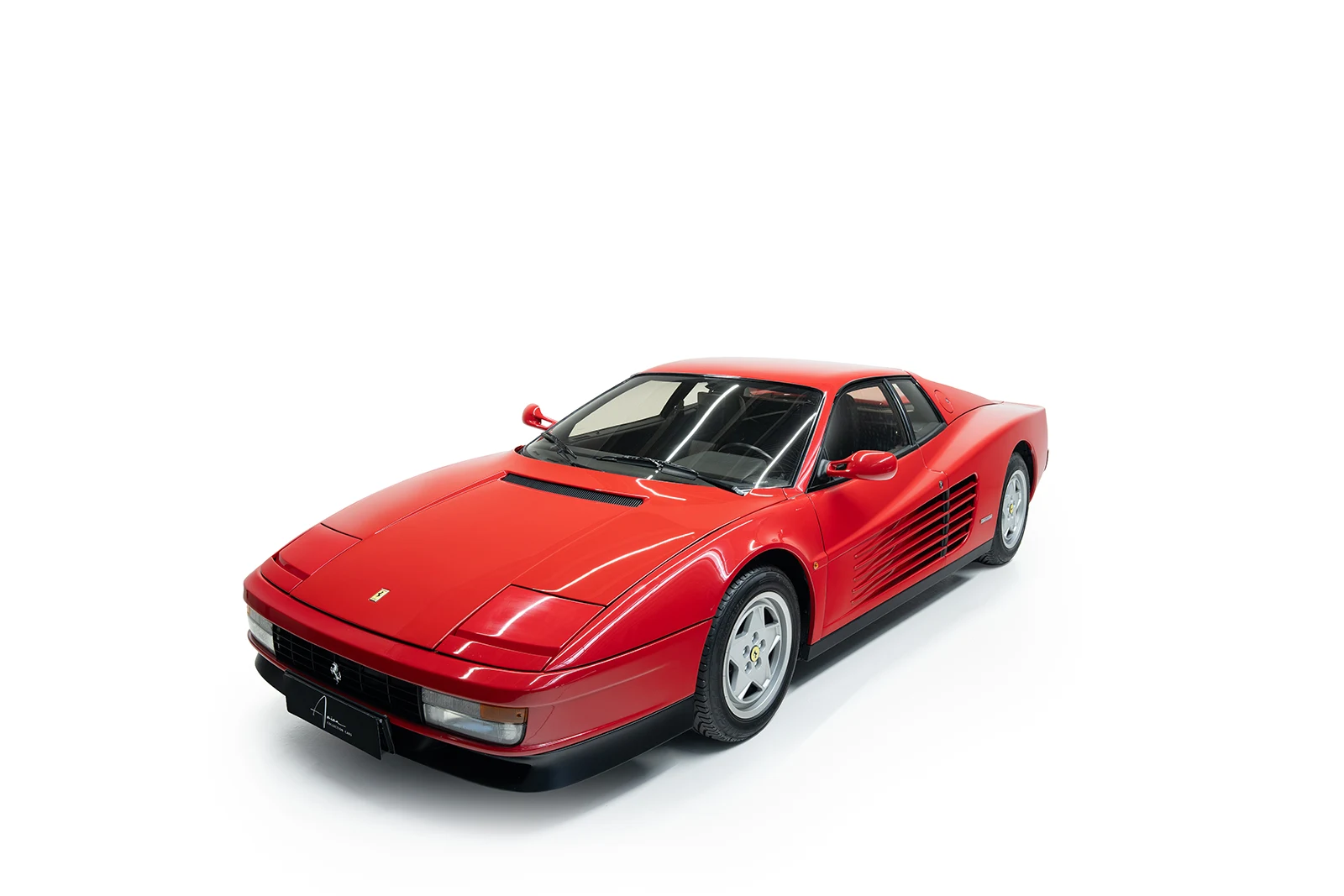 Red Ferrari Testarossa, full front three-quarter view