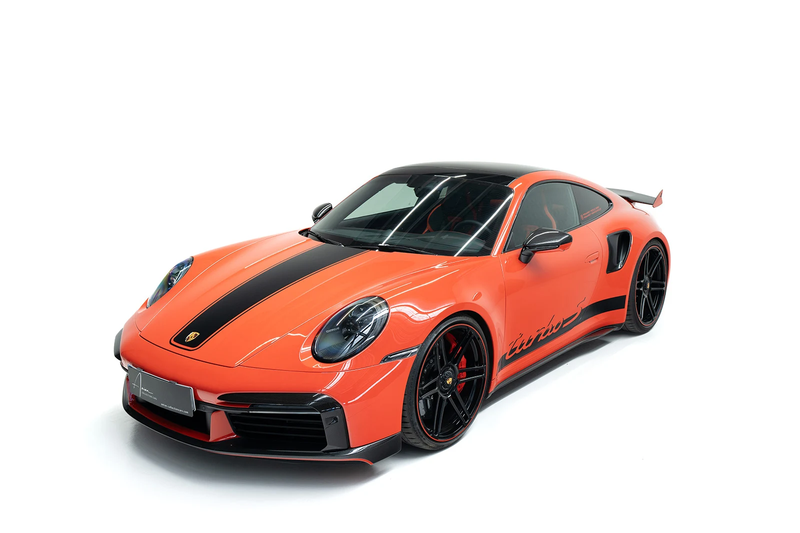 Orange Porsche 911 Turbo S MANHART TR 800, full front three-quarter view