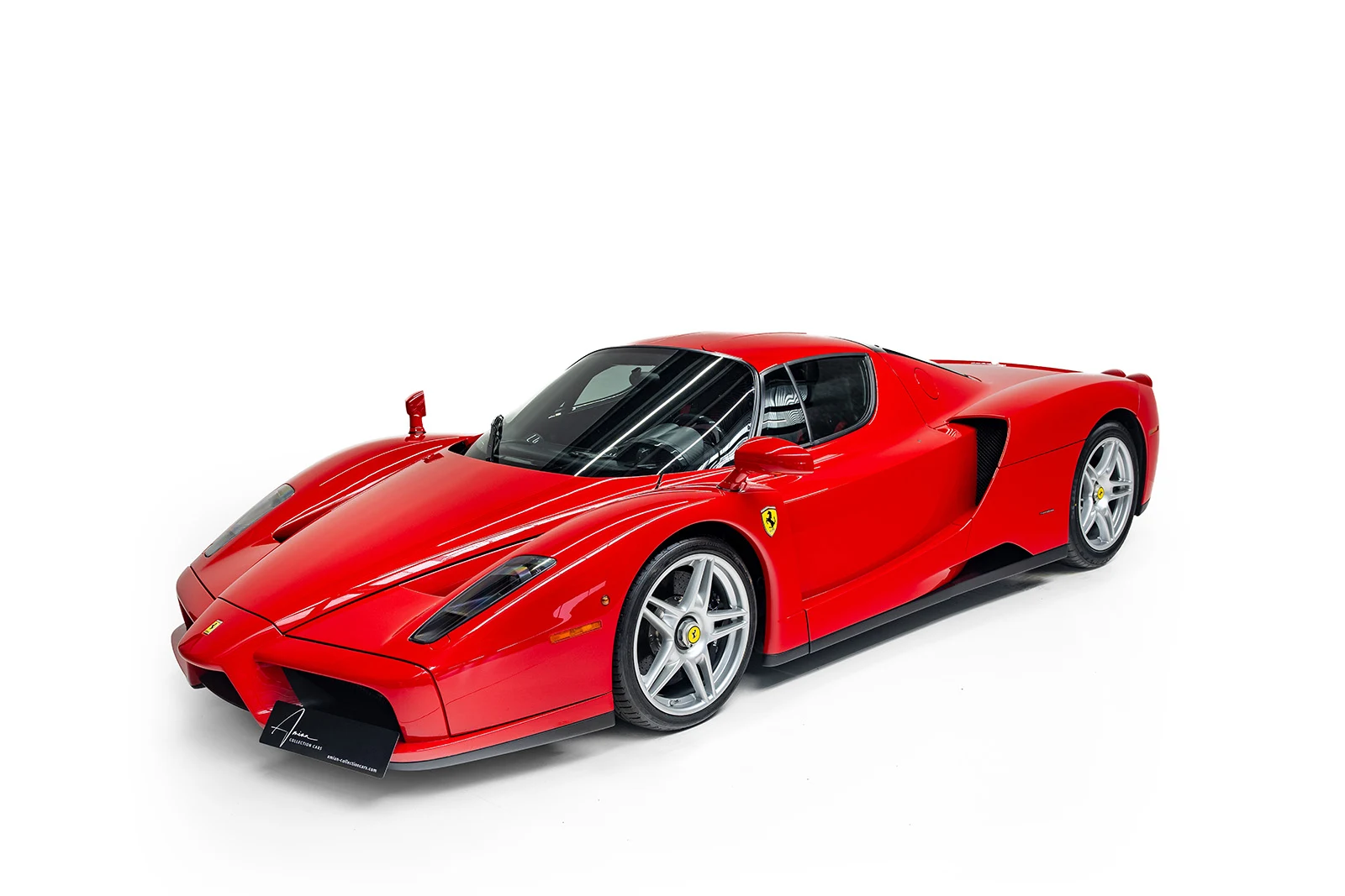 Red Ferrari Enzo, full front three-quarter view