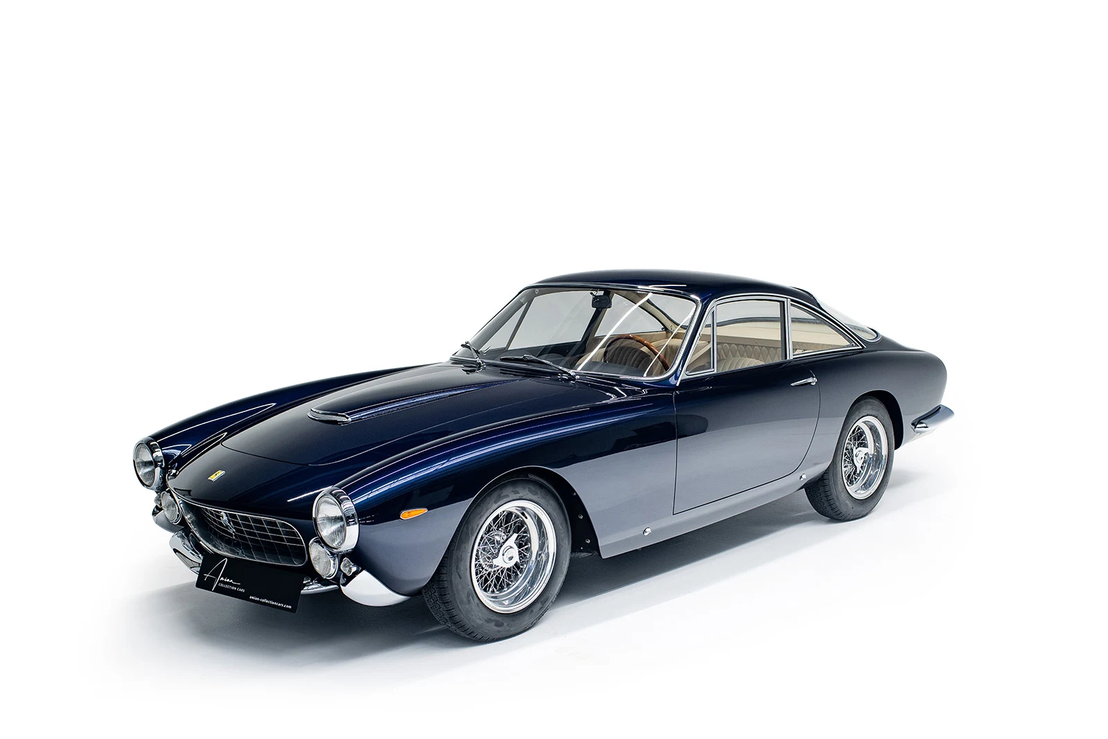 Dark blue Ferrari 250 GT Lusso, full front three-quarter view