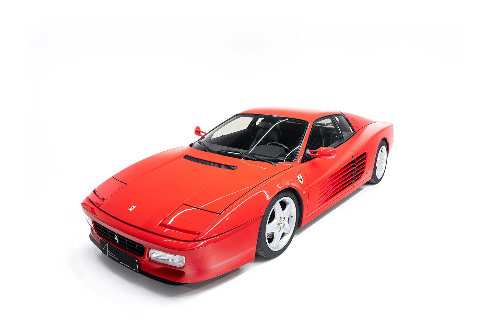 Red Ferrari 512 TR, full front three-quarter view