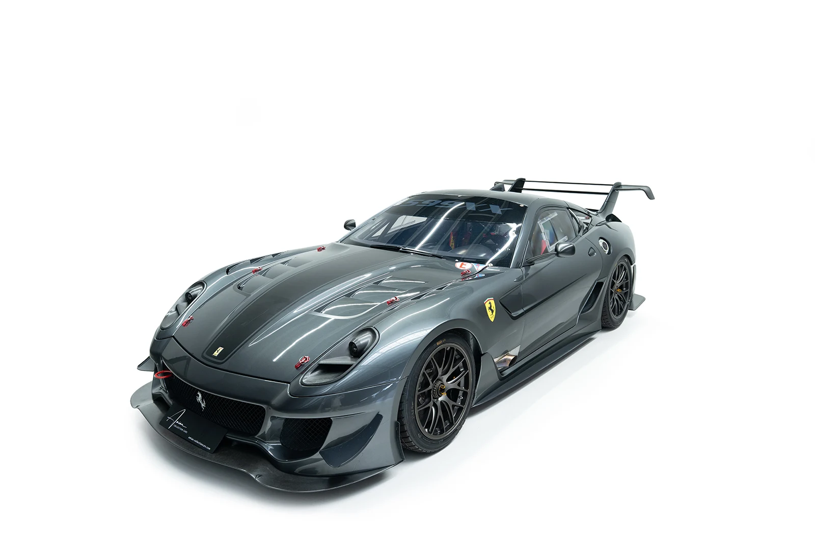 Gray Ferrari 599XX Evo, full front three-quarter view