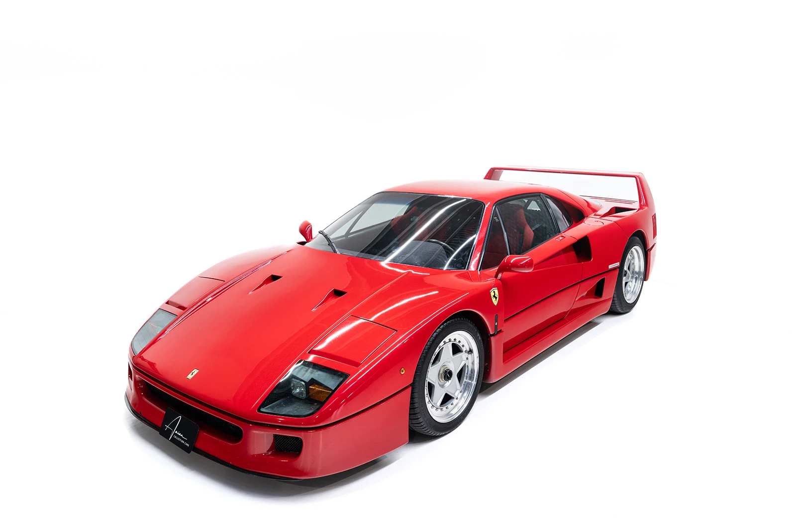 Red Ferrari F40, full front three-quarter view