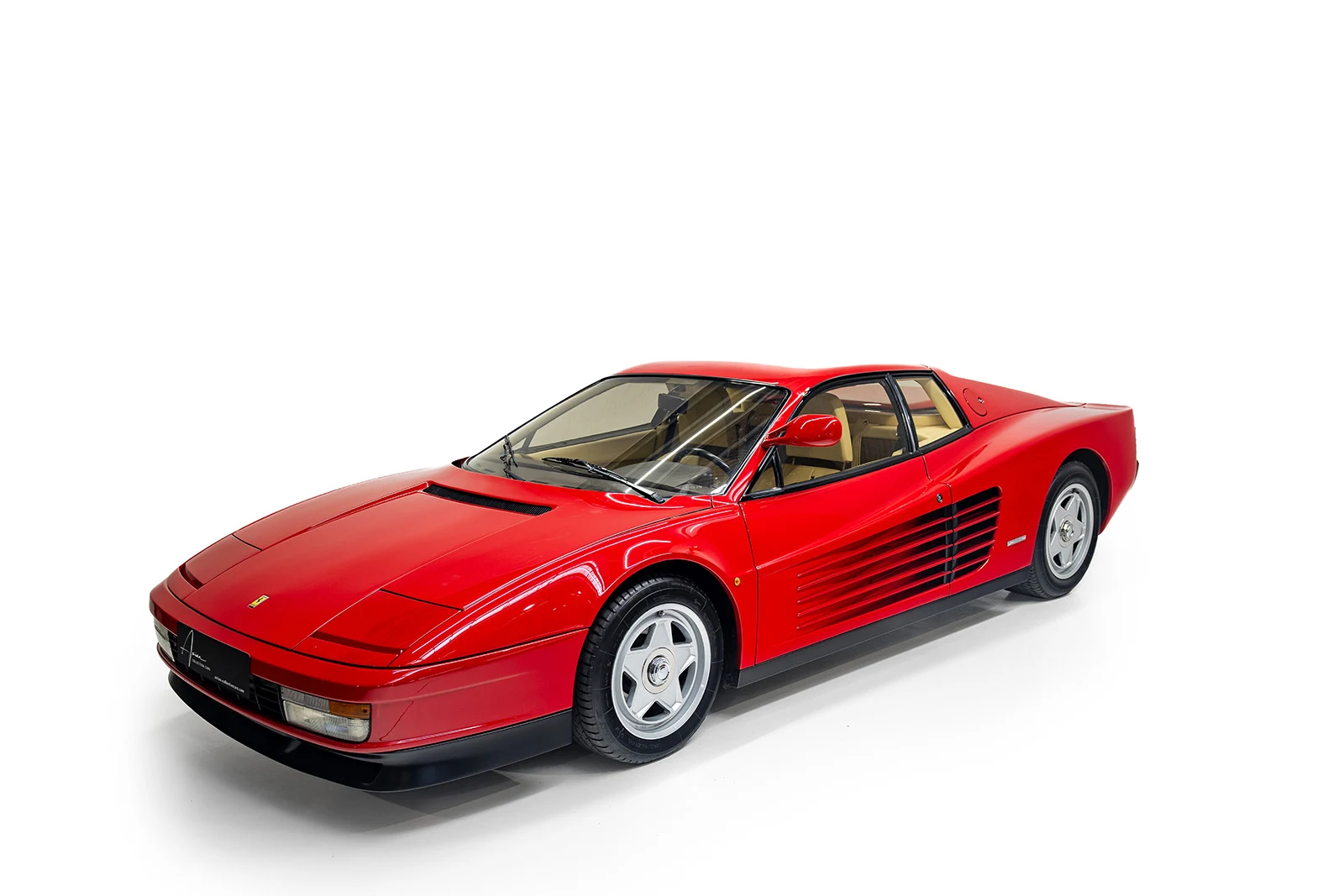 Red Ferrari Testarossa, full front three-quarter view