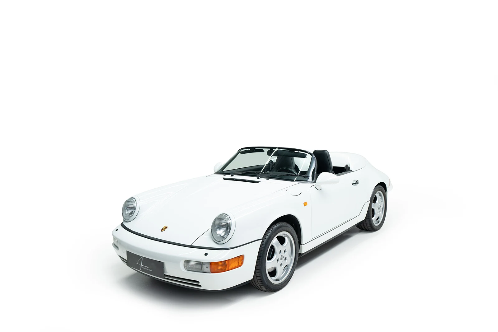 White Porsche 911 Speedster, full front three-quarter view