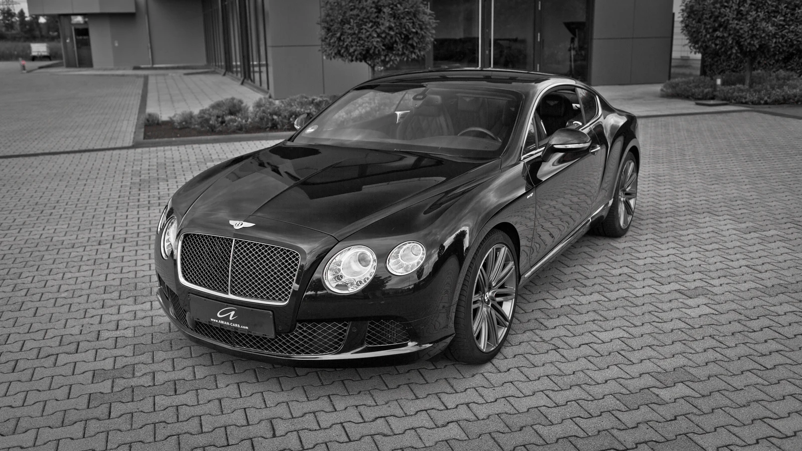 Black Bentley Continental GT Speed, full front three-quarter view