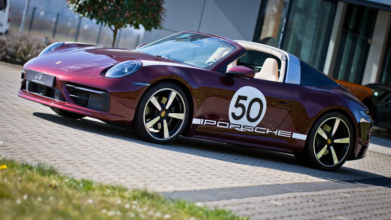Cherry red Porsche 911 Targa Heritage, full front three-quarter view