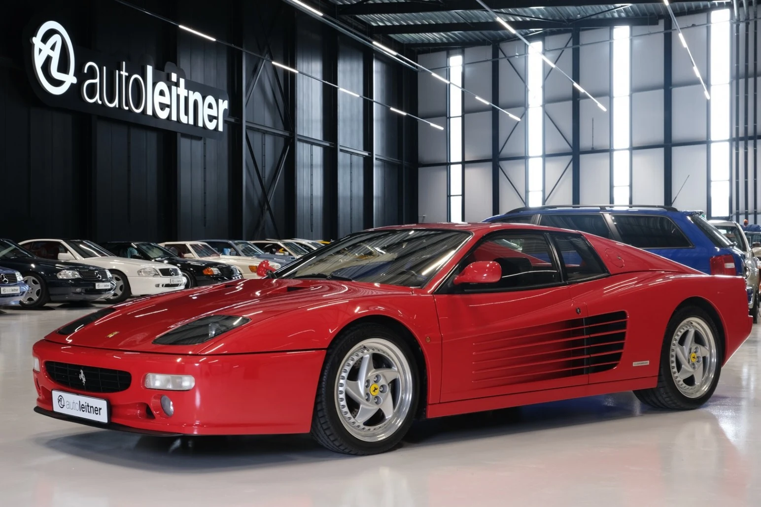 Red Ferrari F512 M, full front three-quarter view