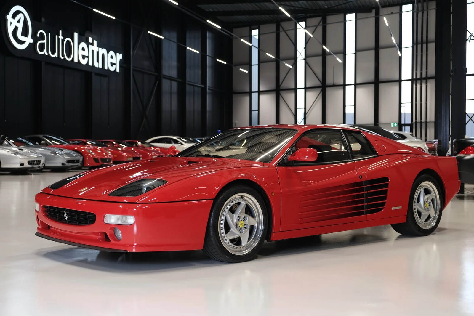 Red Ferrari 512 TR, full front three-quarter view