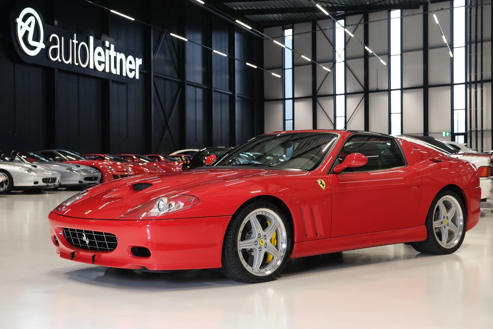 Red Ferrari 575M Superamerica, full front three-quarter view