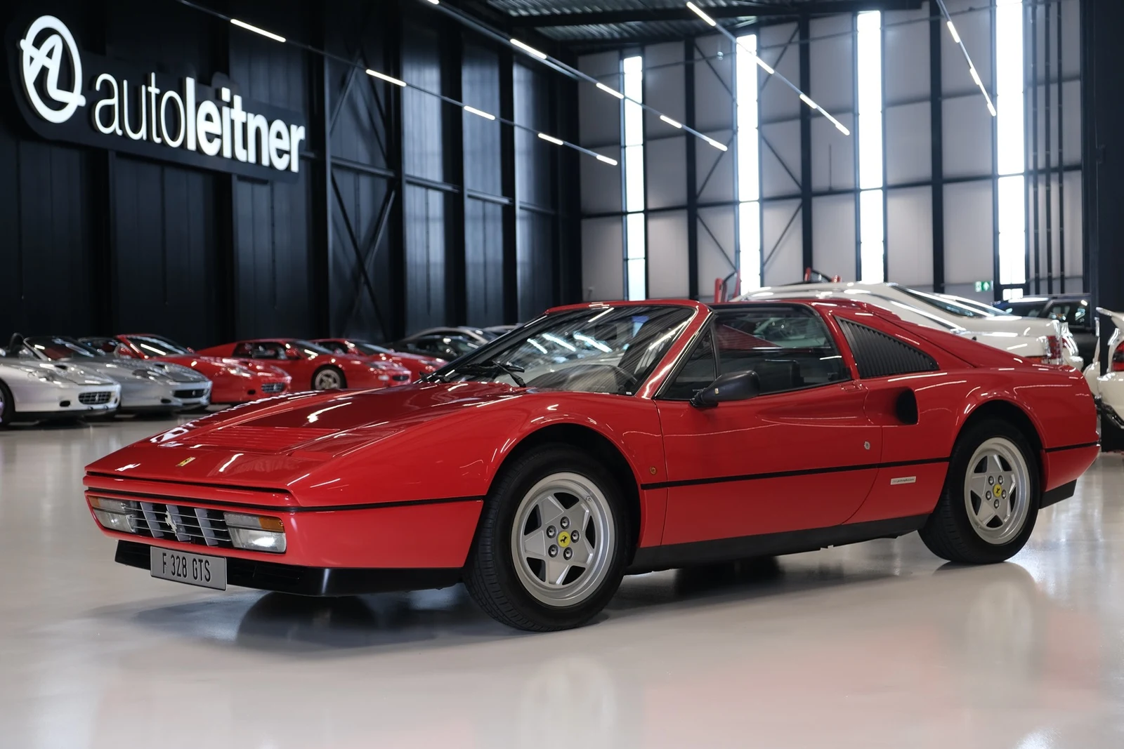 Red Ferrari 328 GTS, full front three-quarter view