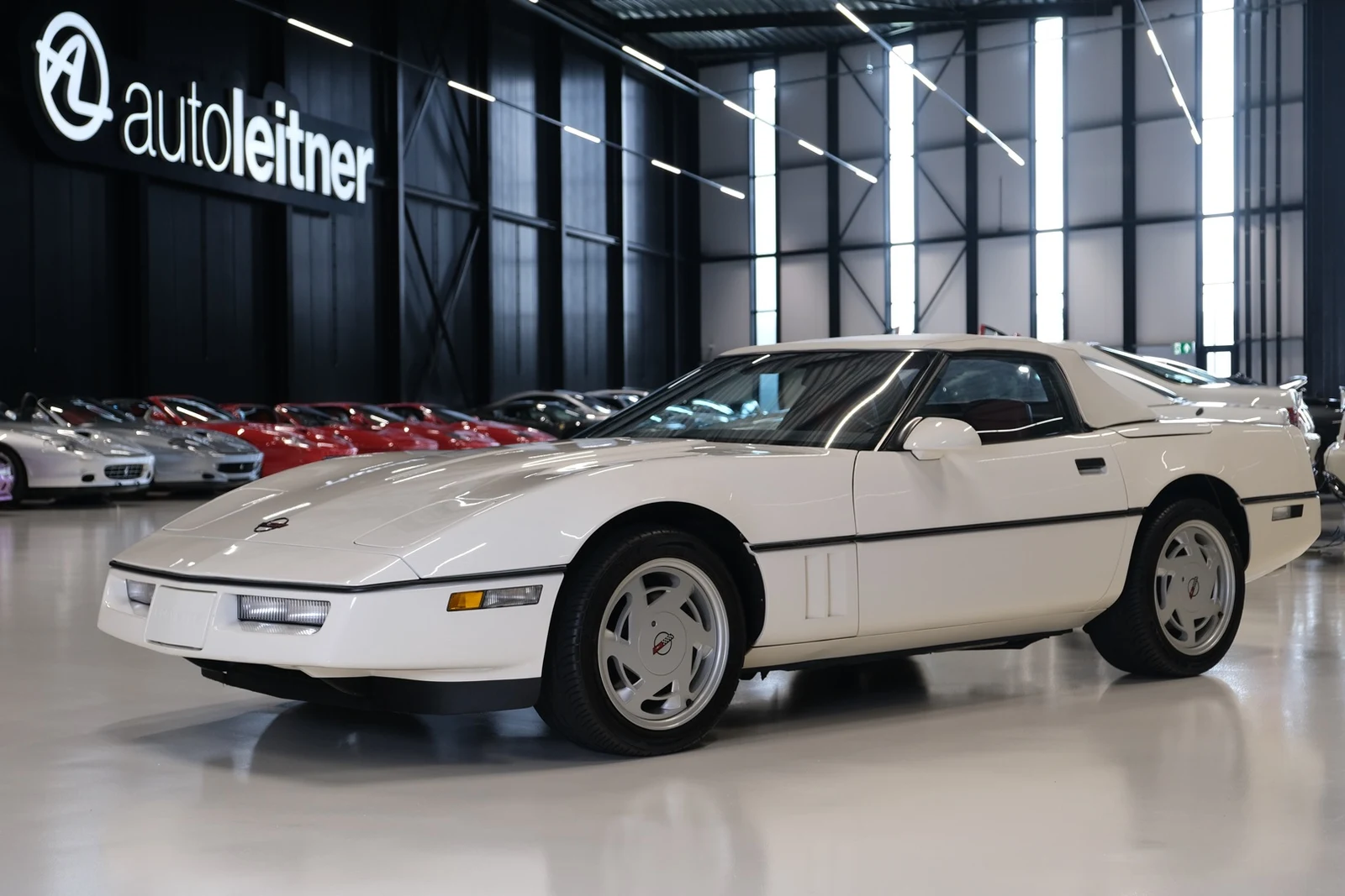 White Chevrolet Corvette C4 Convertible, full front three-quarter view