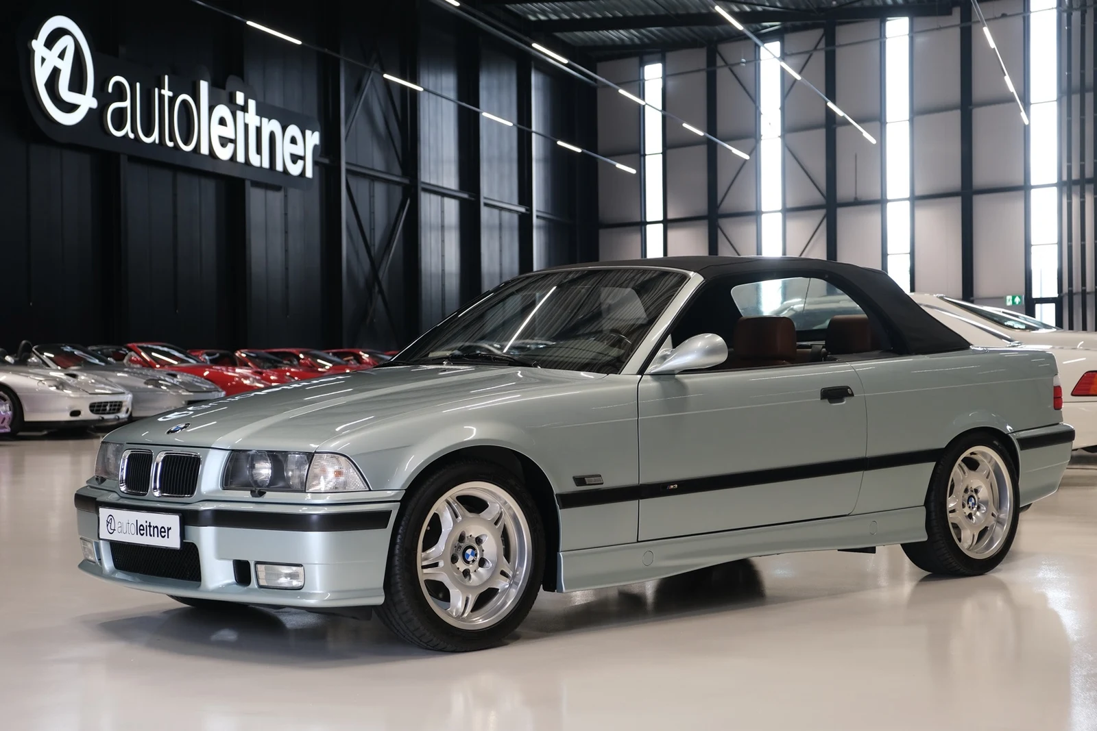 Silver-green BMW M3 Cabriolet E36, full front three-quarter view