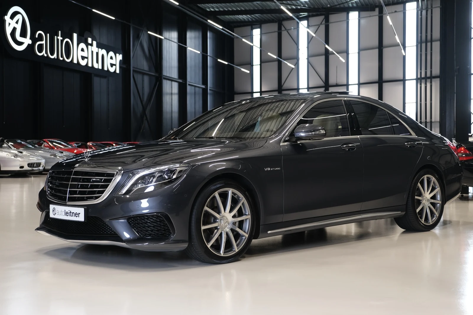 Gray Mercedes-AMG S 63, full front three-quarter view