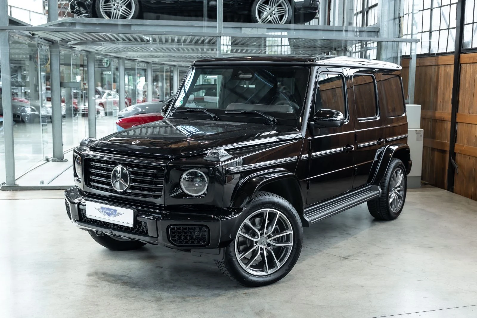 Black Mercedes-Benz G 450 d, full front three-quarter view