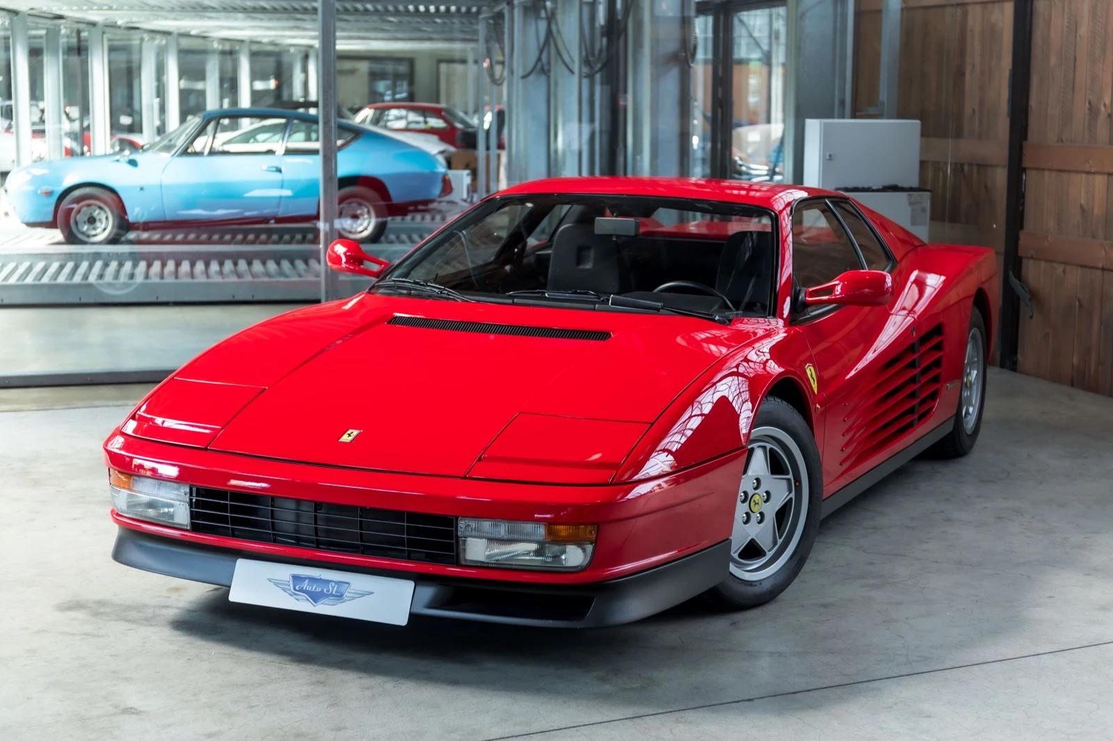 Red Ferrari Testarossa, full front three-quarter view