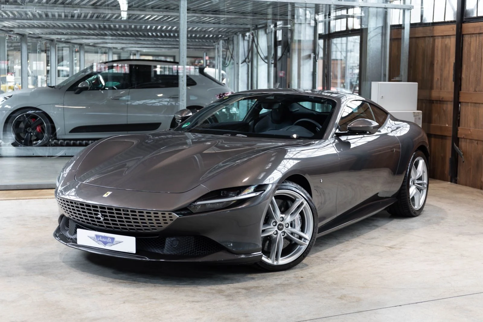 Gray Ferrari Roma, full front three-quarter view