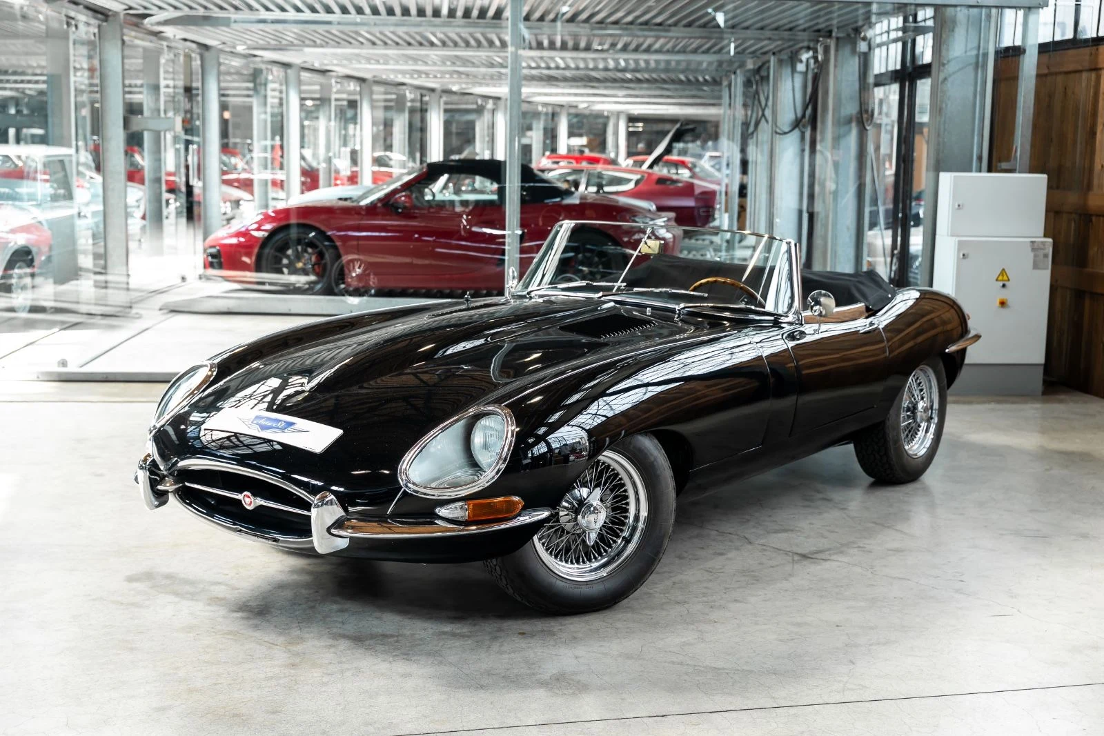 Black Jaguar E-Type Roadster, full front three-quarter view
