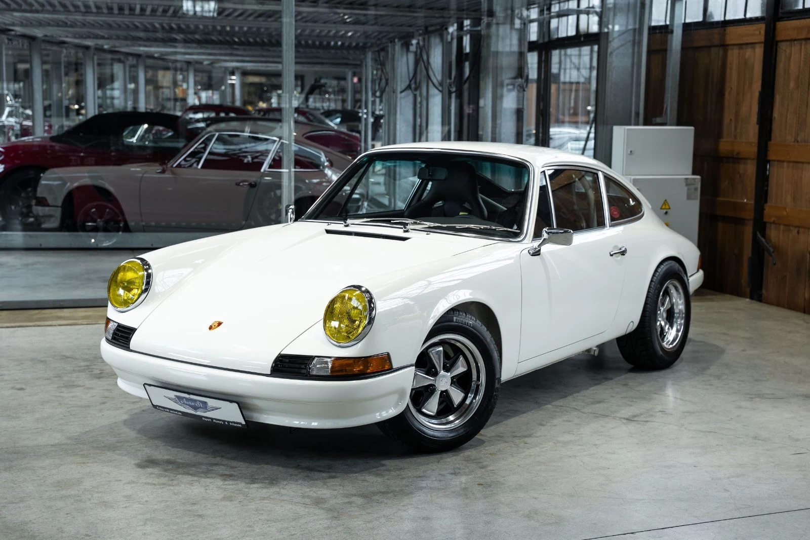 White Porsche 911 Backdate, full front three-quarter view