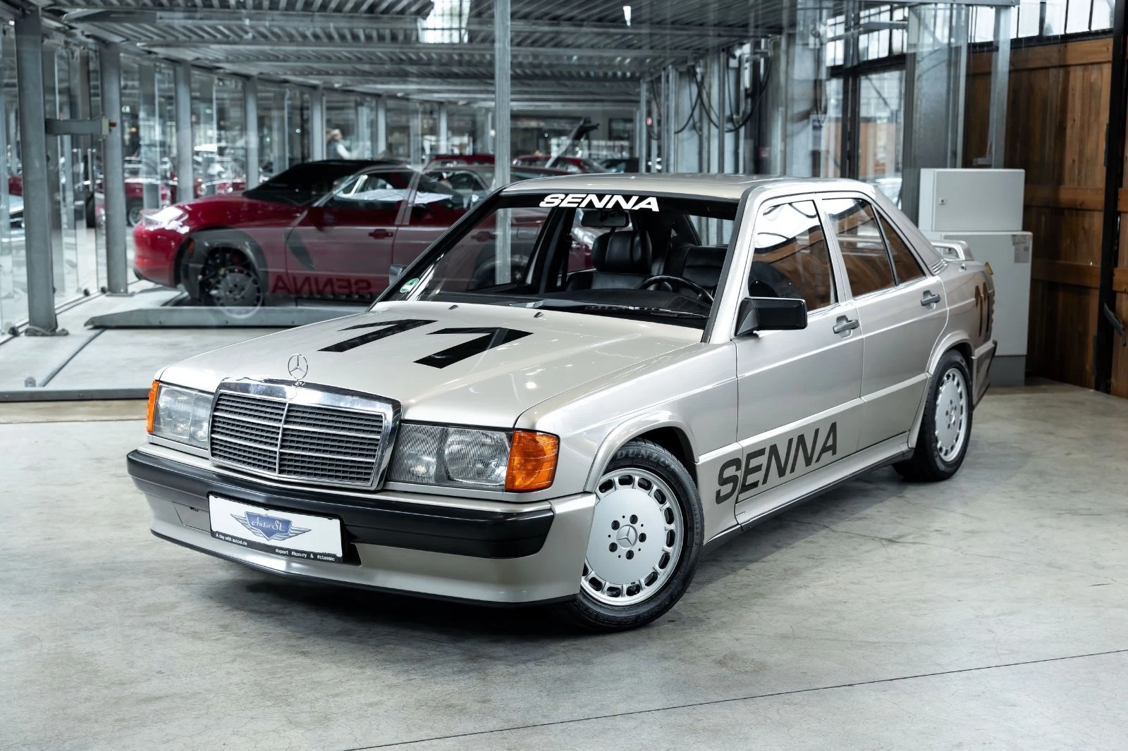 Silver Mercedes-Benz 190 E 2.3-16, full front three-quarter view