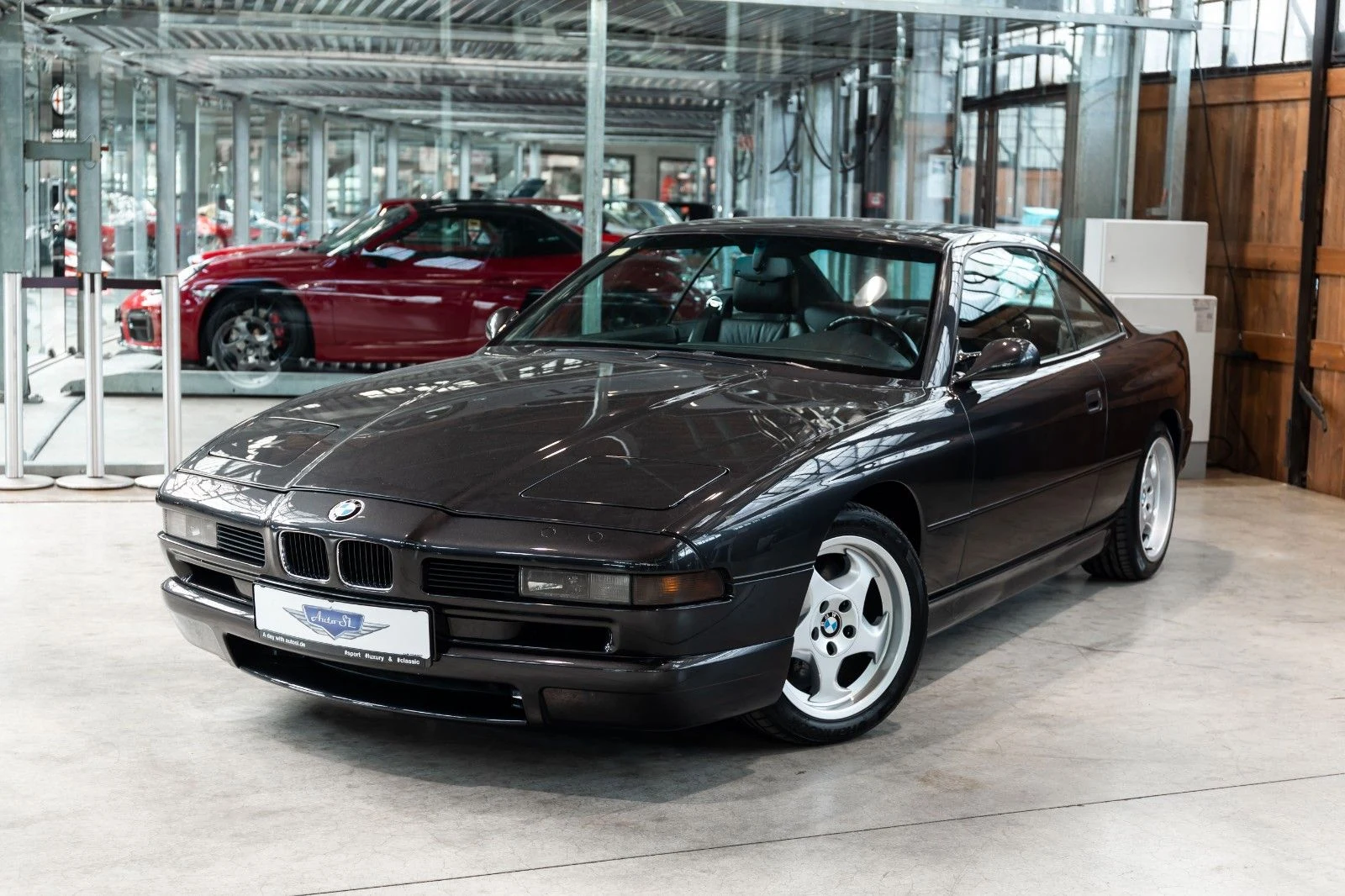 Black BMW 850 CSi, full front three-quarter view