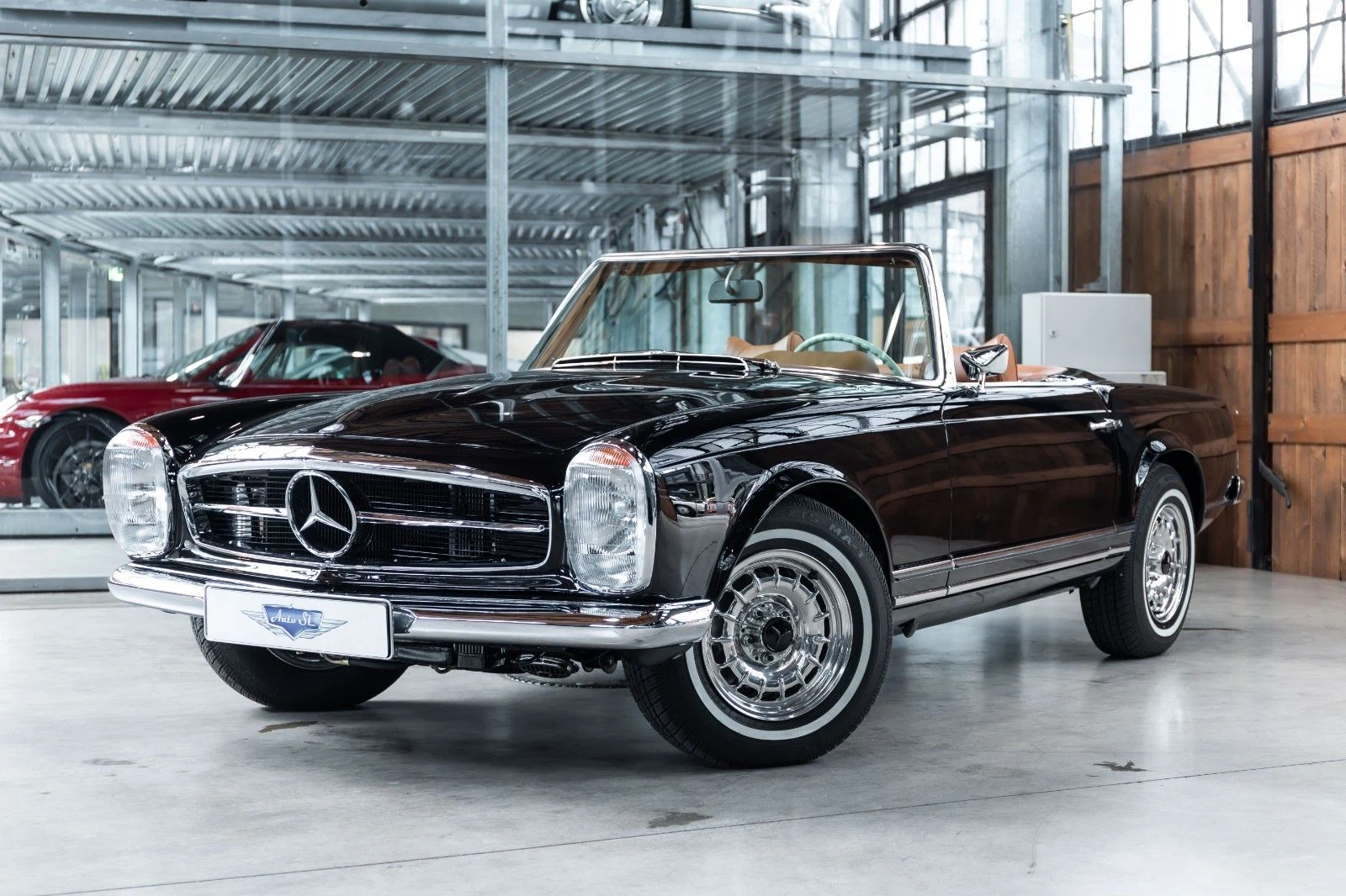 Black Mercedes-Benz 280 SL Pagoda, full front three-quarter view