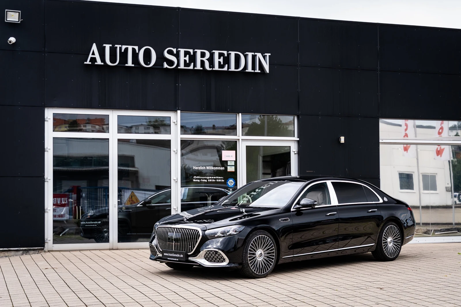 Black Mercedes-Maybach S 580, full front three-quarter view