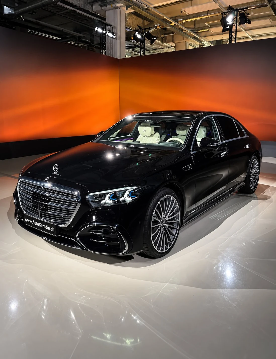 Black Mercedes-Benz S 580, full front three-quarter view