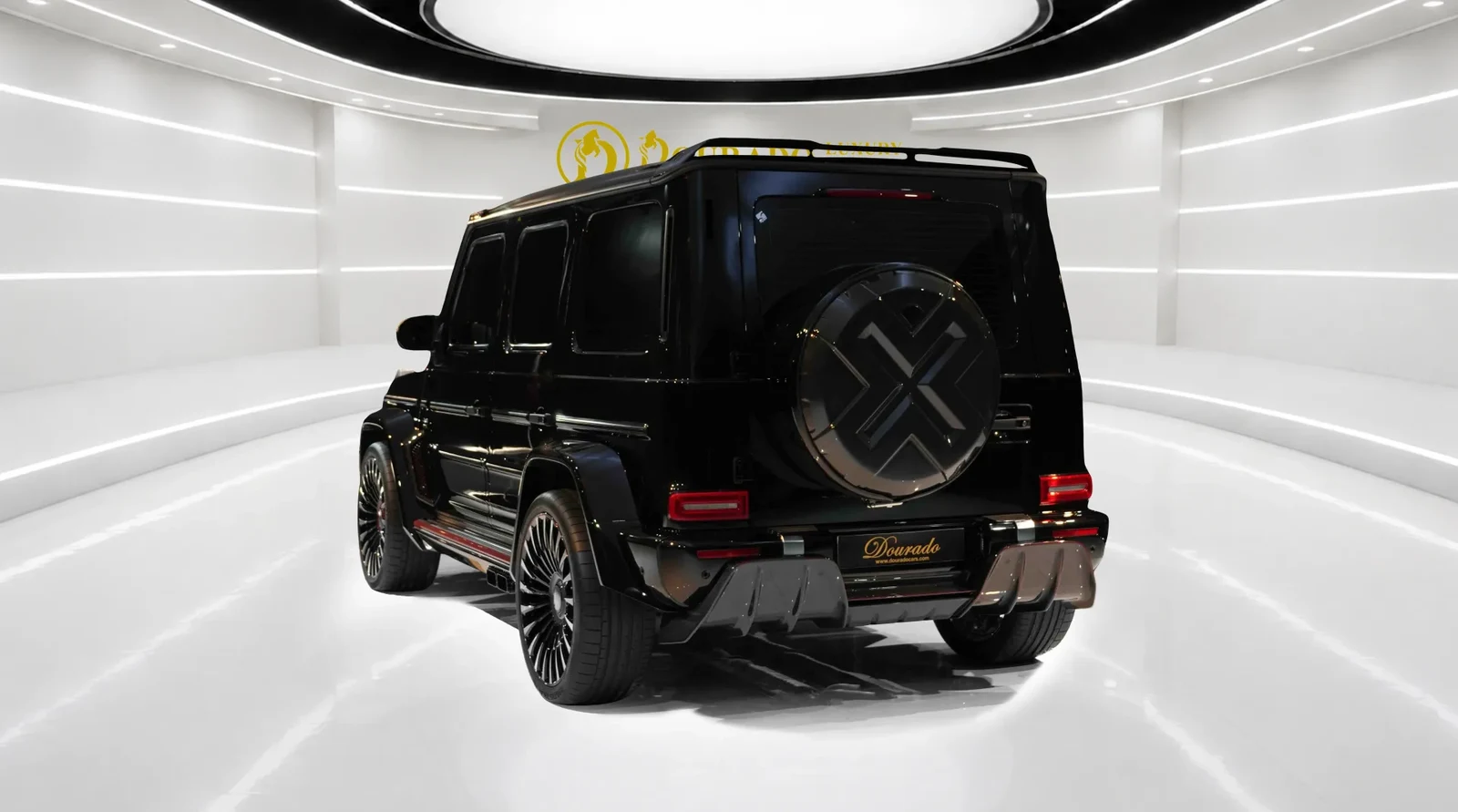 2021 Mercedes-AMG G 63 with Onyx G7X Kit, rear three-quarter view, Black