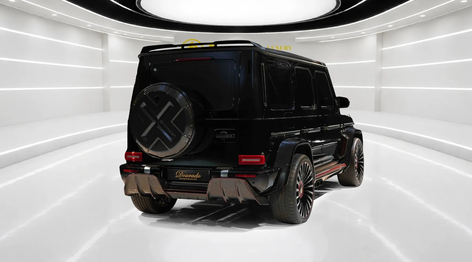 2021 Mercedes-AMG G 63 with Onyx G7X Kit, rear three-quarter view, Black