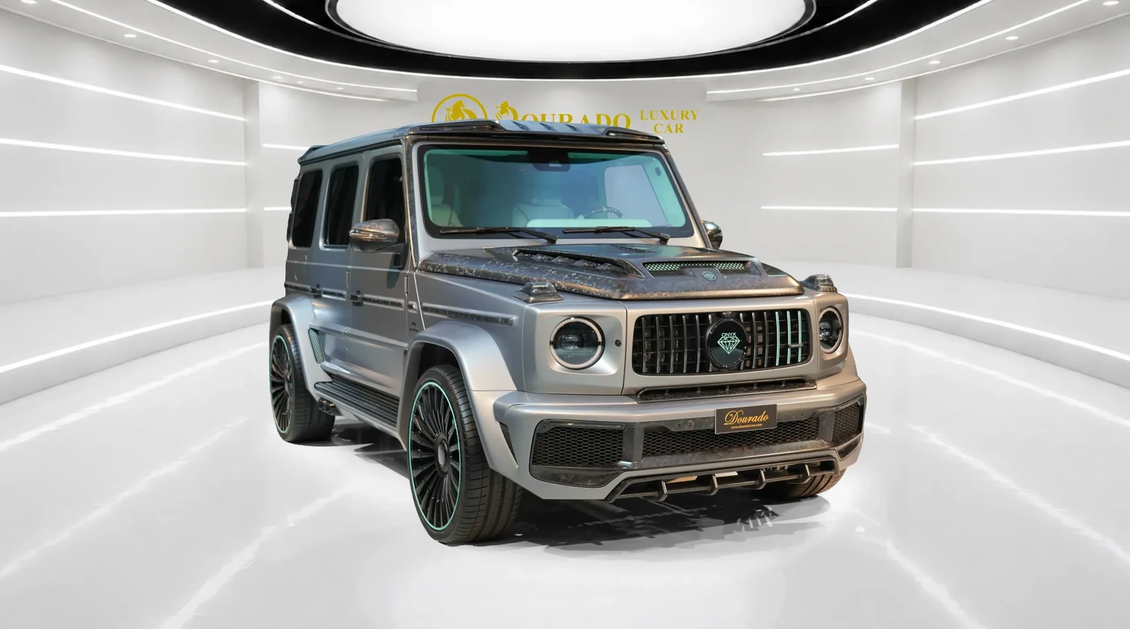 2023 Mercedes-Benz G-Class G7X by Onyx Concept, Designo Platinum Magno, complete car from a front three-quarter angle