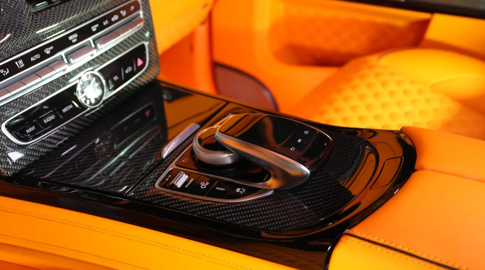 2021 Mercedes-Benz G-Class BRABUS G800 interior, center console, Mandarin Orange