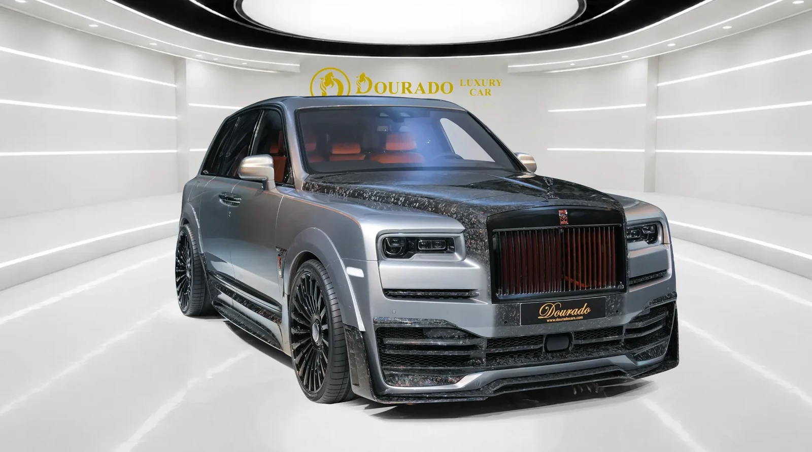 2023 Rolls-Royce Cullinan Black Badge by Onyx Concept, Jubilee Silver, complete car from a front three-quarter angle