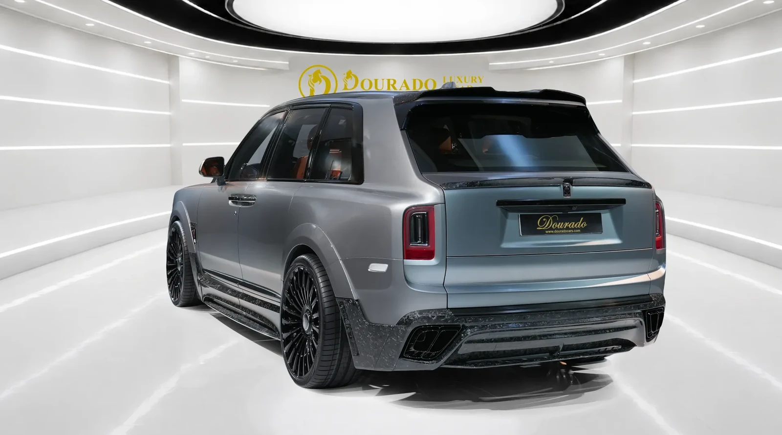 2023 Rolls-Royce Cullinan Black Badge by Onyx Concept, rear three-quarter view, Jubilee Silver
