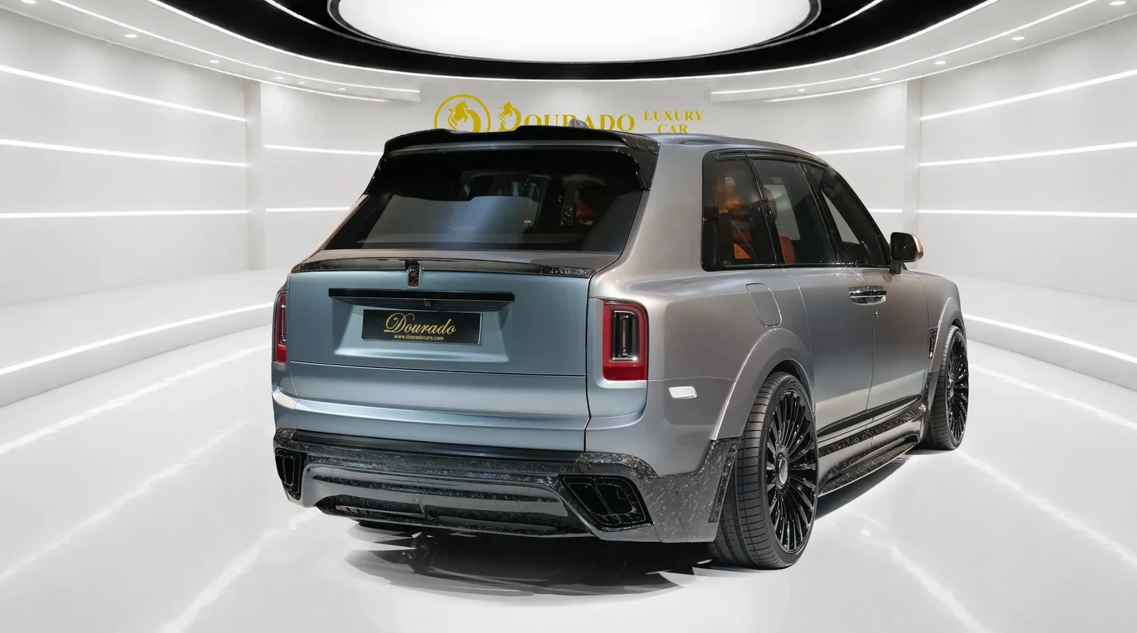 2023 Rolls-Royce Cullinan Black Badge by Onyx Concept, rear three-quarter view, Jubilee Silver