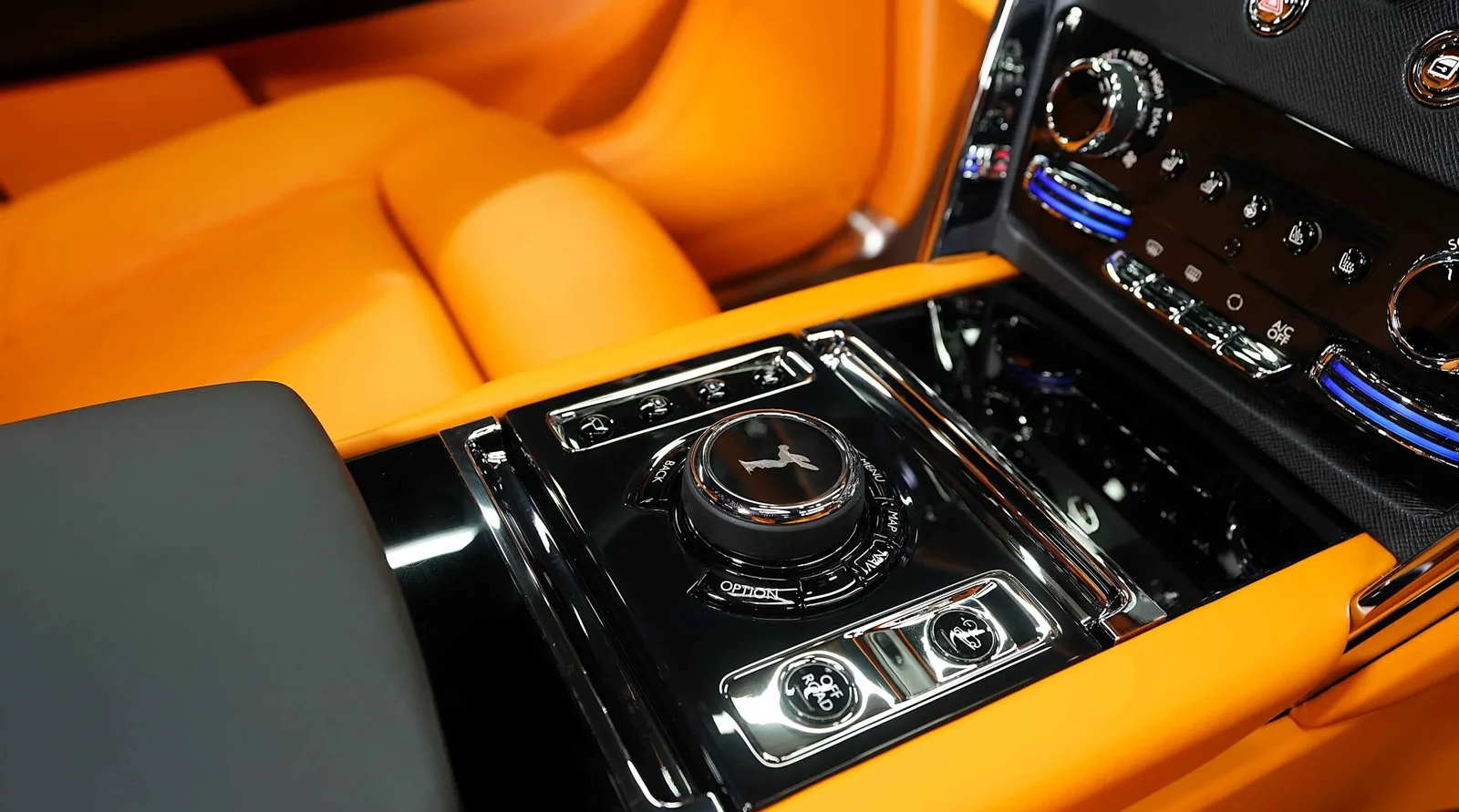 2024 Rolls-Royce Cullinan by Onyx Concept interior, center console, Mandarin Orange