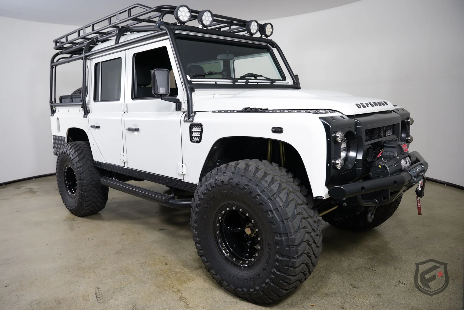 1992 Land Rover Defender Pickup LS3 Bigfoot custom in Alpine White offered by Fusion Luxury Motors in Chatsworth, California