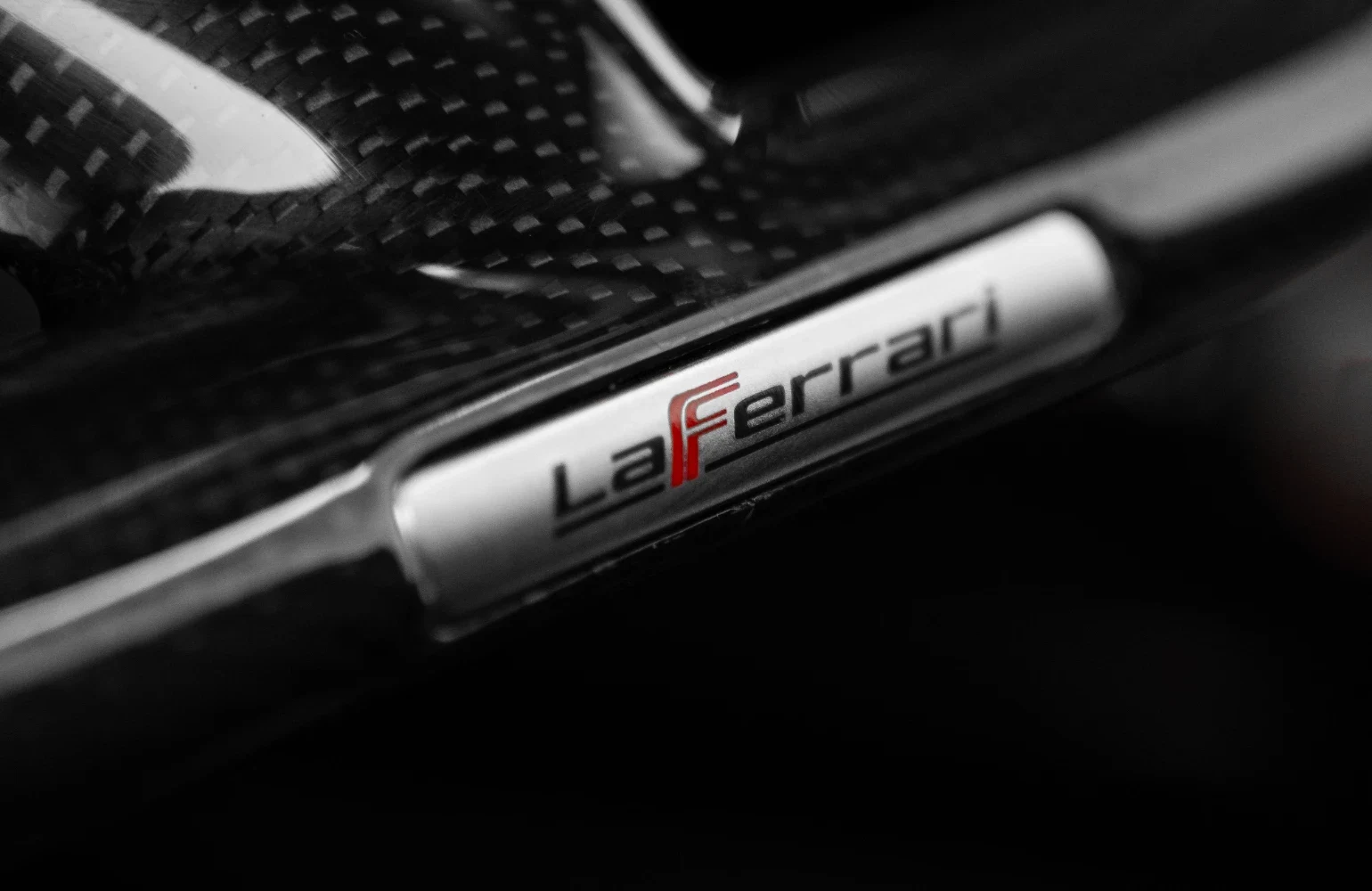 2015 Ferrari LaFerrari interior, door sill, Black Alcantara with yellow seat belts