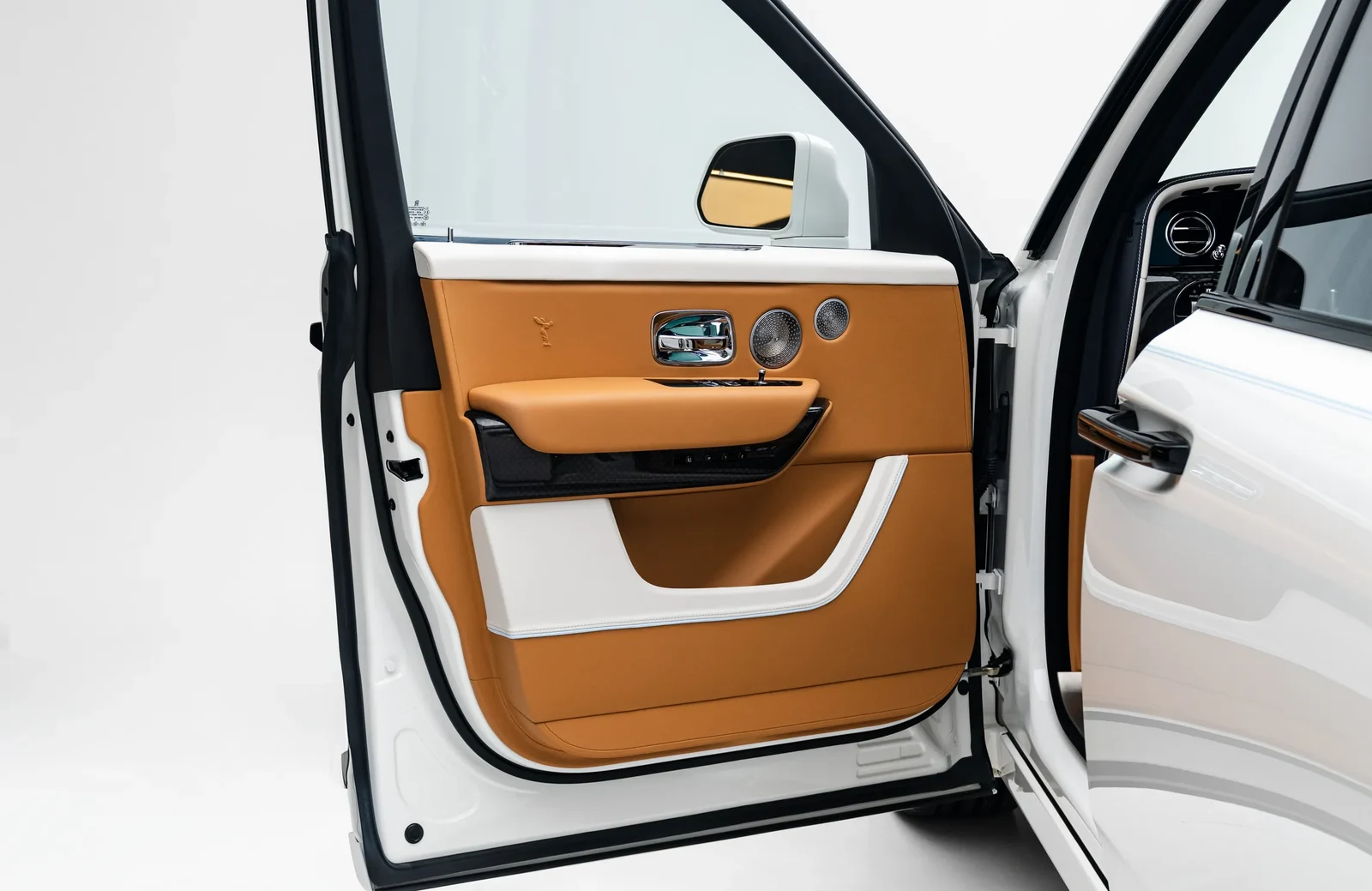 2025 Rolls-Royce Cullinan Black Badge Series II interior, door panel, Brown and White