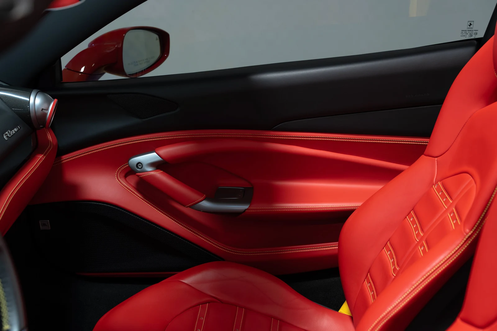 2021 Ferrari F8 Spider interior, door panel, Rosso Ferrari