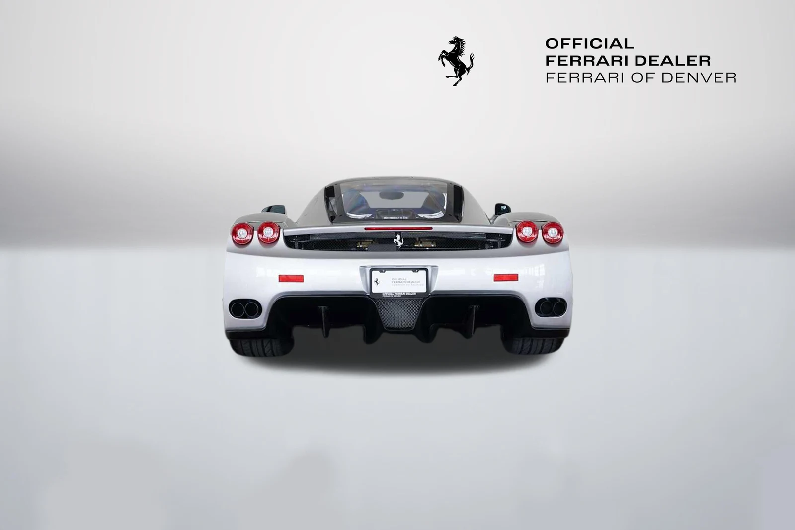 2004 Ferrari Enzo, rear three-quarter view, Silver