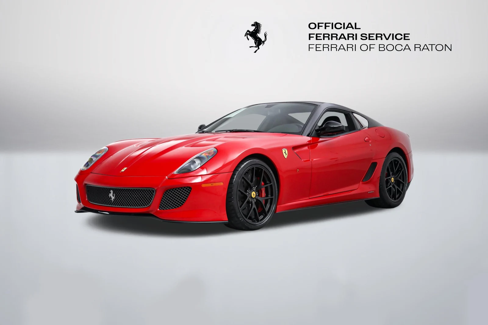 Rosso Corsa Ferrari 599 GTO in a front three-quarter view
